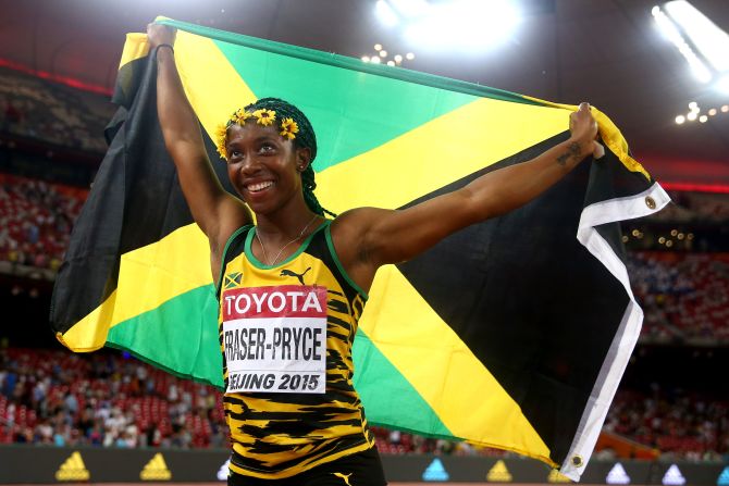 Shelly-Ann Fraser-Pryce celebrates after winning gold in the women's 100 meters final in Beijing.