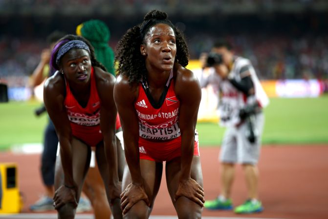 American runner Tori Bowie (left) won bronze. Here she looks at the video screen after the race along with Kelly-Ann Baptiste of Trinidad and Tobago, who was sixth.  