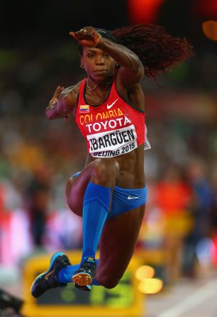 Colombia's Caterine Ibarguen successfully defended her triple-jump title. 