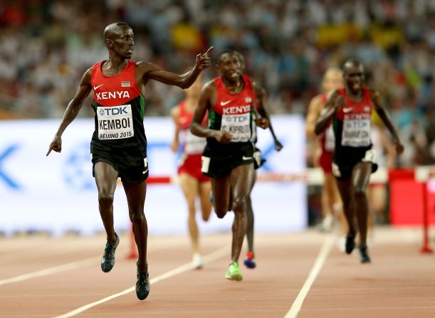 Ezekiel Kemboi celebrates his fourth successive men's 3,000m steeplechase title, as Kenyan runners took the first four places. 