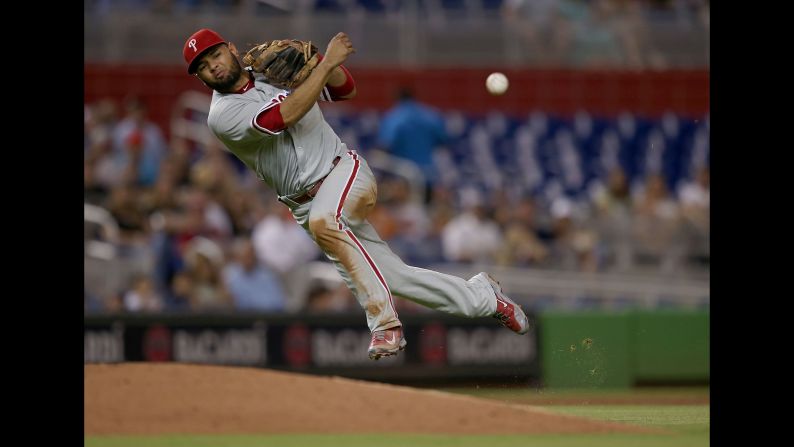 Philadelphia third baseman Andres Blanco throws to first base during a game in Miami on Friday, August 21.