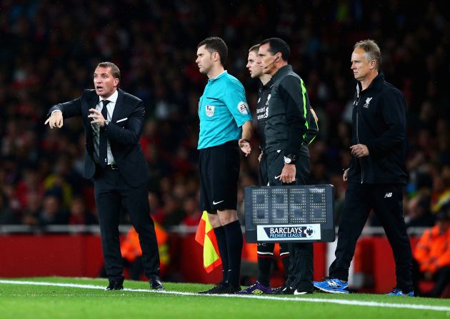 Liverpool manager Brendan Rodgers (left) gives instructions as he prepares to make a second-half substitution.