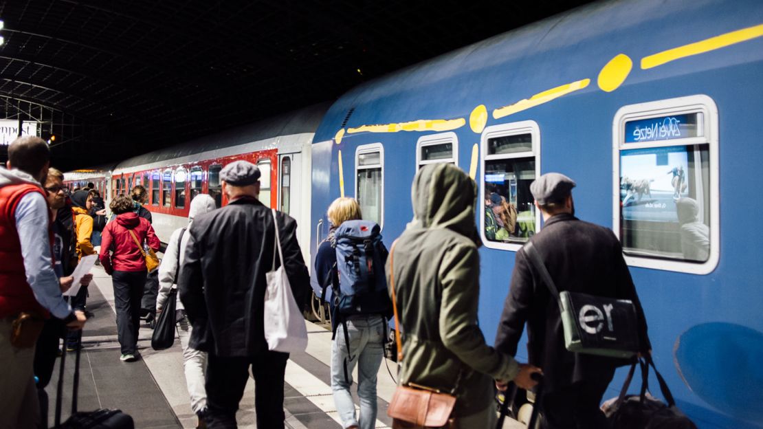 Passengers jostle to board the Prague-Oberhausen sleeper. 