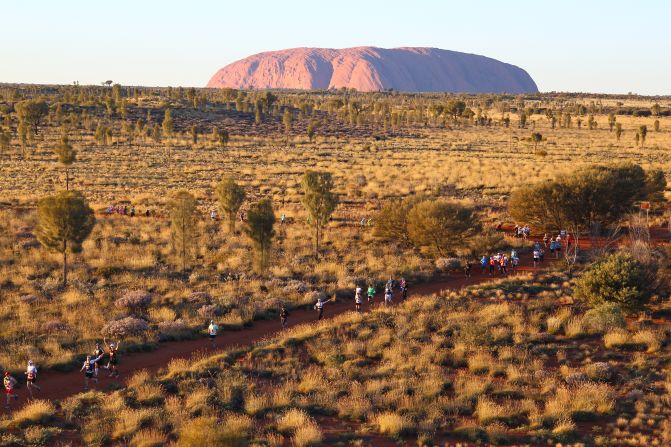 Australia's magnificent monolith, Uluru, looms in the background as competitors race across the country's red center. The next edition of <a href="index.php?page=&url=http%3A%2F%2Faustralianoutbackmarathon.com%2F" target="_blank" target="_blank">the marathon</a> will be held in July 2016.