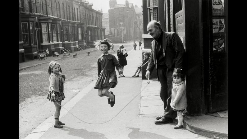 Baker could find humor -- such as this 1968 Manchester photo of a man helping girls jump rope -- in apparent bleakness. "Shirley had an eye beyond that of the pure recorder of fact; she had an uncanny ability to spot incidental humor in the scenes of everyday life which surrounded her," Tom Gillmor, head of content for the Mary Evans Picture Library -- where Baker's pictures are archived -- <a href="index.php?page=&url=http%3A%2F%2Fwww.bbc.com%2Fnews%2Fin-pictures-29410300" target="_blank" target="_blank">told the BBC after her death. </a>