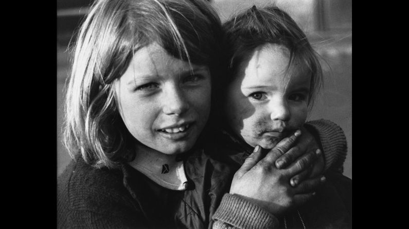 Though the pictures date from the '60s and '70s -- this one is from 1973 Manchester -- they have a timelessness that harks back to the Britain of Dickens or anticipates the downtrodden neighborhoods of children today. "We often think of these areas and that time in black and white, because that was how they were photographed, but there was color there, as I recorded it," she wrote <a href="index.php?page=&url=http%3A%2F%2Fwww.tate.org.uk%2Fcontext-comment%2Farticles%2Fits-all-about-people" target="_blank" target="_blank">in an essay for London's Tate Museum. </a><br />