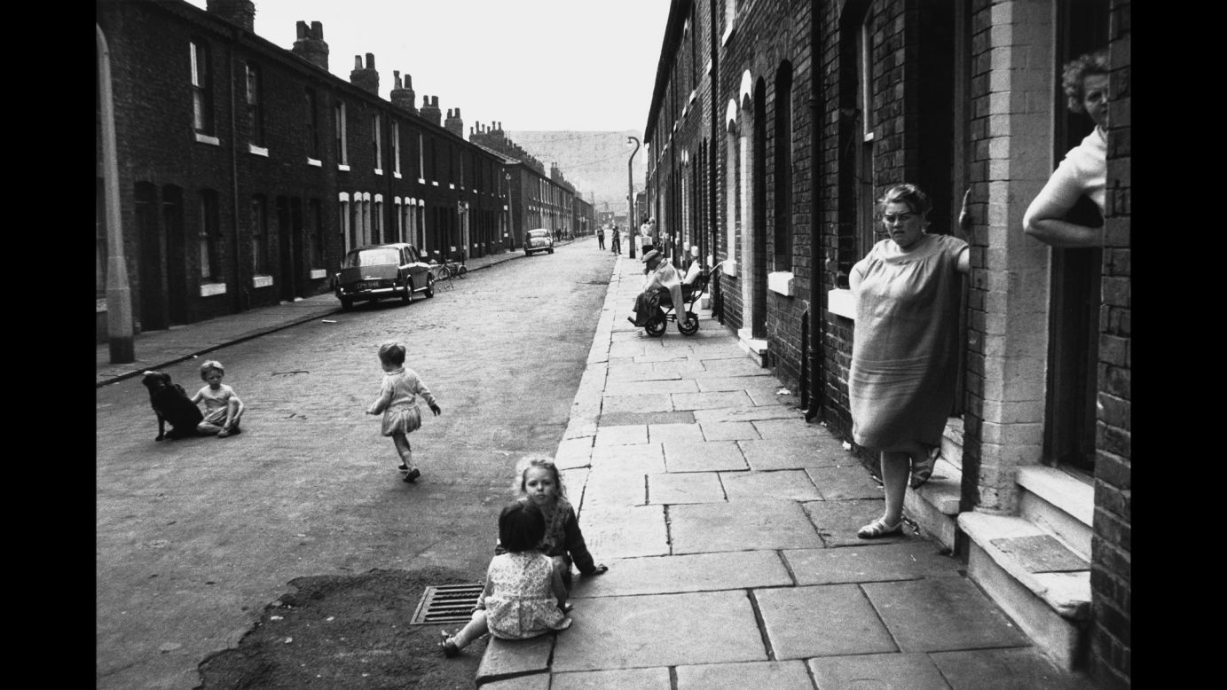 The streets are both ghostly and lively. "When Shirley Baker began photographing the streets of her native Salford, it seemed that no one was interested in recording the human story of these soon-to-be demolished communities," Gillmor told the BBC. "That she chose to preserve these moments on film now seems like the only perceptive response to a vanishing environment." This photo is of Manchester in 1966.