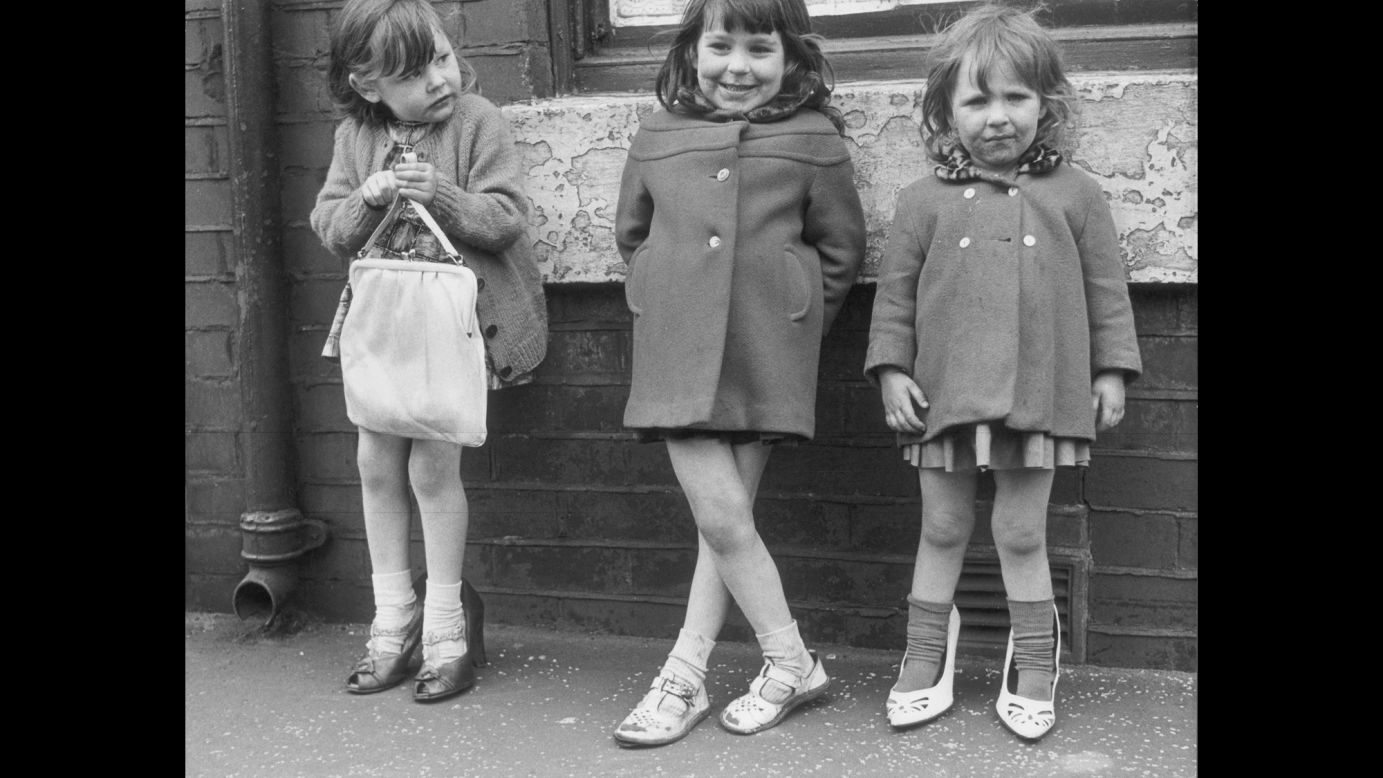 These three girls were photographed in Manchester in 1965. "What I was doing was about the people," Baker wrote for the Tate. "I would go with an idea of perhaps taking pictures of textures, peeling paint, etc, but I always ended up photographing the people." 