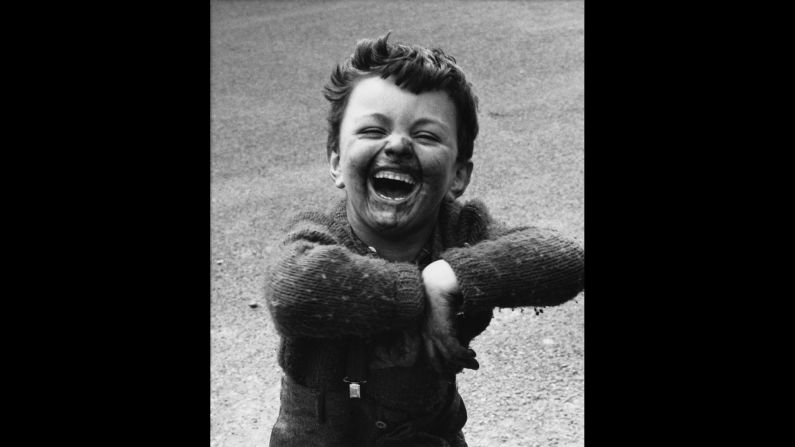Even in the worst circumstances there was celebration, as with this boy in 1968 Manchester. As Gillmor wrote, Baker's work offers "humor, social history and the innocence and joy of youth, set against a backdrop of a rapidly changing world." 