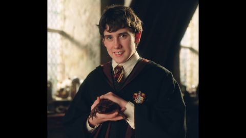 Lewis sported a slightly different look as Neville in the "Harry Potter" films. 