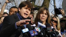 CHICAGO - MARCH 14:   Disgraced former Illinois Governor 2 (L) gestures while speaking at a news conference outside his home March 14, 2012 in Chicago. Blagojevich must report to a federal prison in Colorado by tomorrow, to start serving a 14-year term he received for his conviction on numerous counts of fraud and corruption including attempting to sell the vacant U.S. Senate seat held by then Senator Barack Obama.    (Photo by Frank Polich/Getty Images)