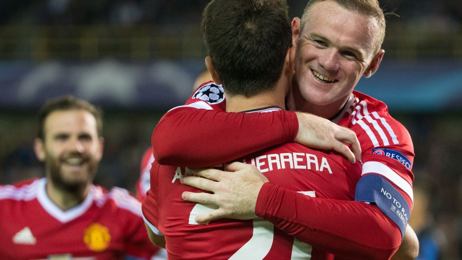 Wayne Rooney celebrates his second goal in the Jan Breydel stadium in Bruges.