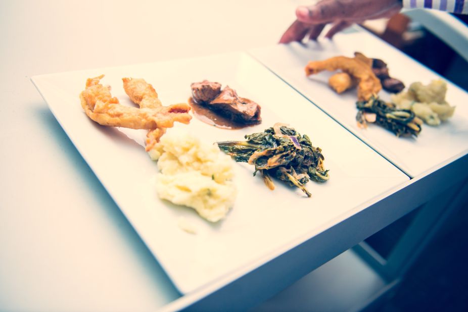A tasting platter of prawn tempura, beef with sauteed vegetables and mashed potatoes leaves the kitchen. Kamara says there are three things his clients will get from the experience. "First is that the absence of sight is a real focus on the culinary experience: on flavors, textures and fragrance."