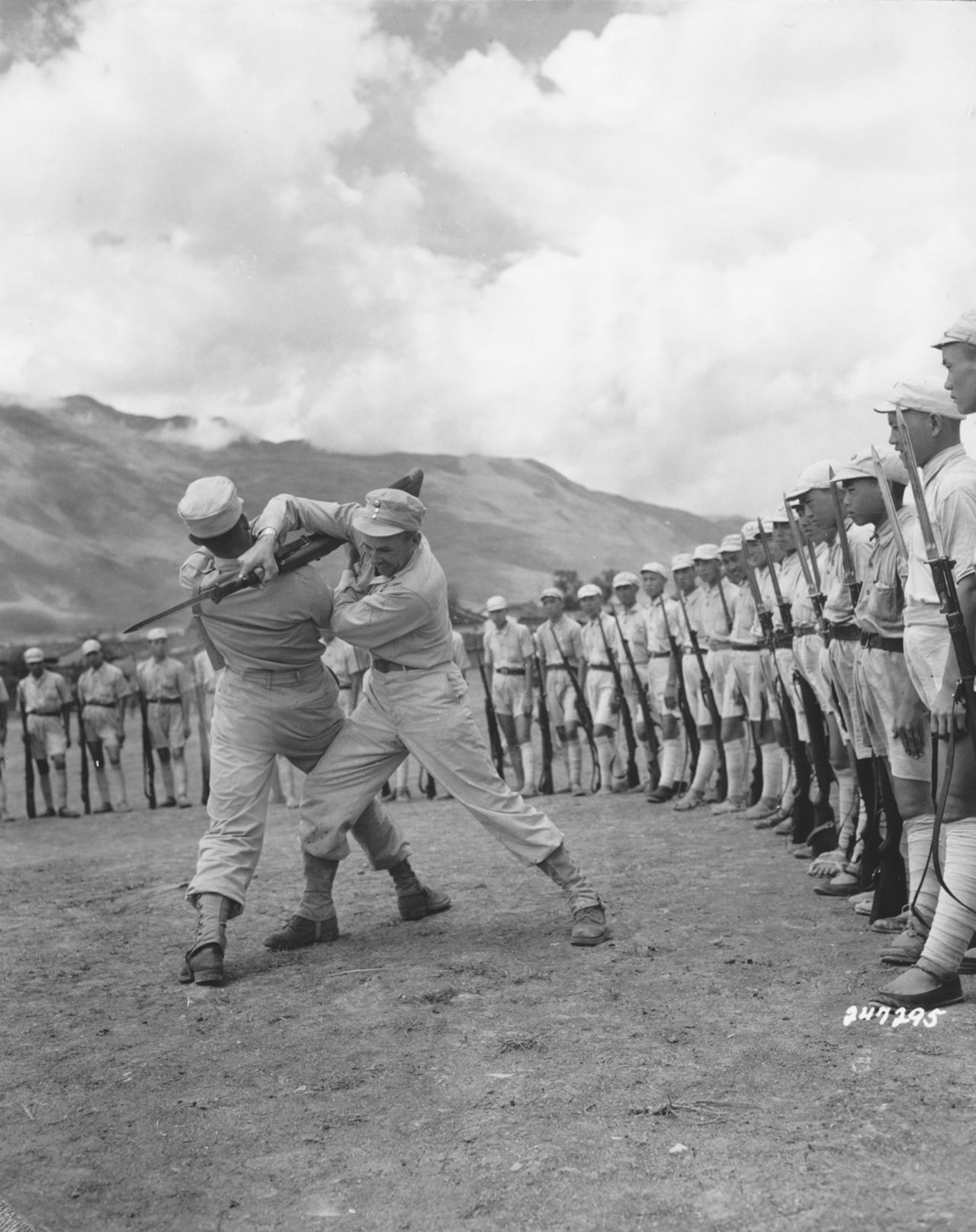The United States and China were allies during World War II and more than 250,000 Americans served in what was known as the "China-Burma-India" theater. Here, a U.S.  sergeant and a lieutenant, both members of the Y-Force Operations Staff, demonstrate methods of disarming the enemy with a bayonet to Chinese soldiers.