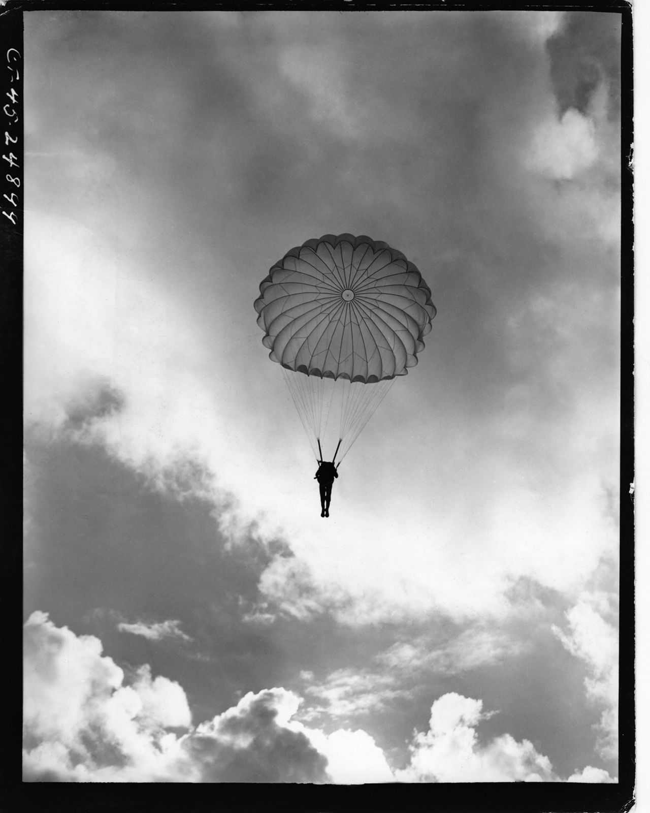 Zhang worked with Retired Army Col. John Easterbrook to bring the photo exhibition to the United States, where many Americans were surprised to learn of of the U.S. effort against Japan in China, Easterbrook says. Here, a Chinese commando being trained as a paratrooper by American officers makes his first jump in Kunming, southwest China.