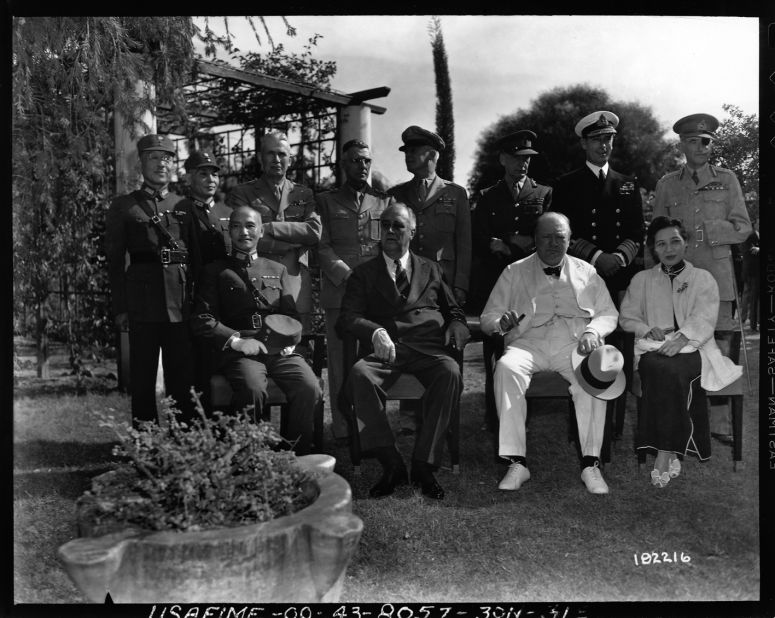 American President Franklin Delano Roosevelt, British Prime Minister Winston Churchill and Chinese leader Chiang Kai-shek meet with other military leaders at the Cairo Conference. The conference addressed issues related to Allied policy against Japan during World War II, and made decisions about the future of Asia. 