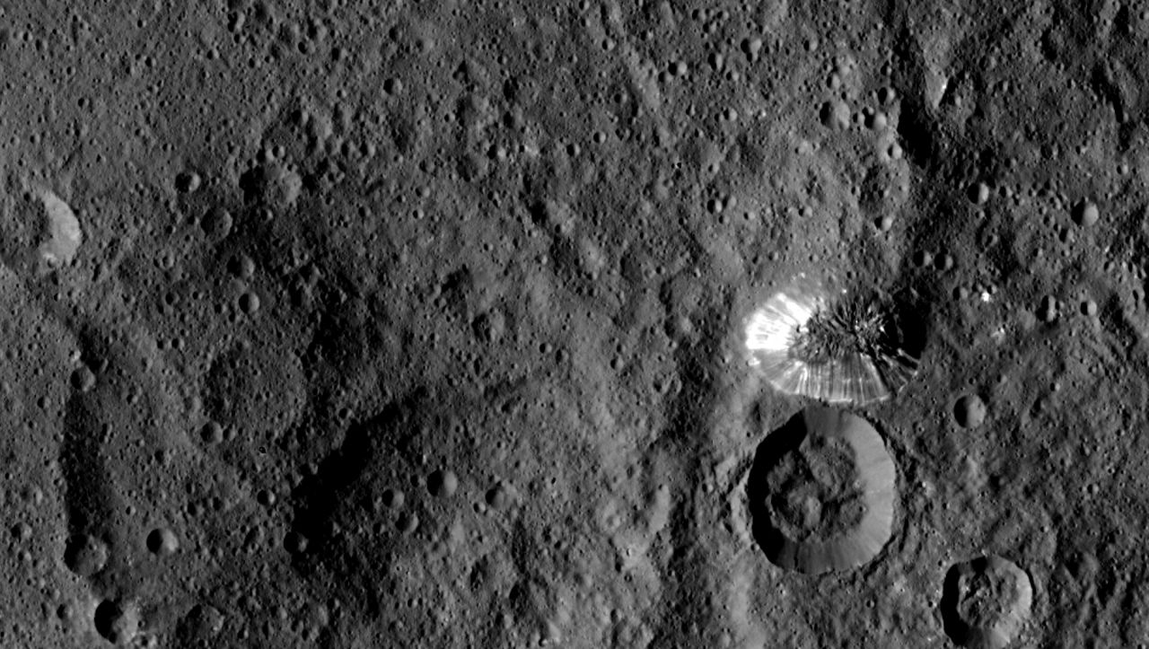 This tall, <a href="http://www.nasa.gov/jpl/dawn-sends-sharper-scenes-from-ceres" target="_blank" target="_blank">conical mountain on Ceres</a> was photographed from a distance of 915 miles (1,473 kilometers) by NASA's Dawn spacecraft. The mountain, located in the dwarf planet's southern hemisphere, is 4 miles (6.4 kilometers) high. The photo was taken on August 19, 2015.