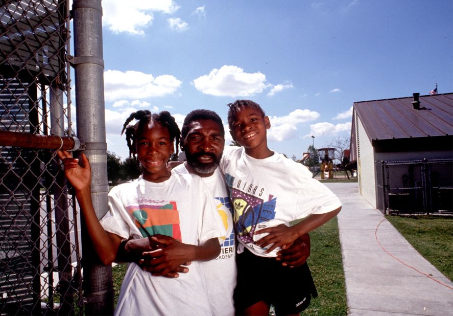 Venus, left, is seen with her father, Richard, and her sister in 1991. Both of the girls would go on to become legends in their sport.