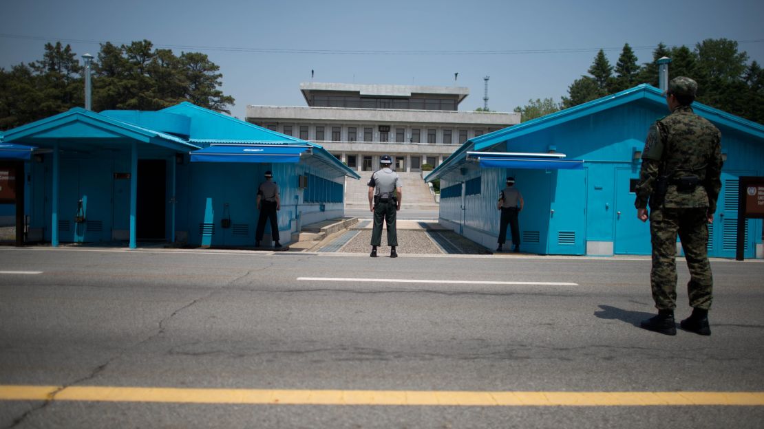 Sout Korean soldiers face the North Korean side at the truce village of Panmunjom in the DMZ.