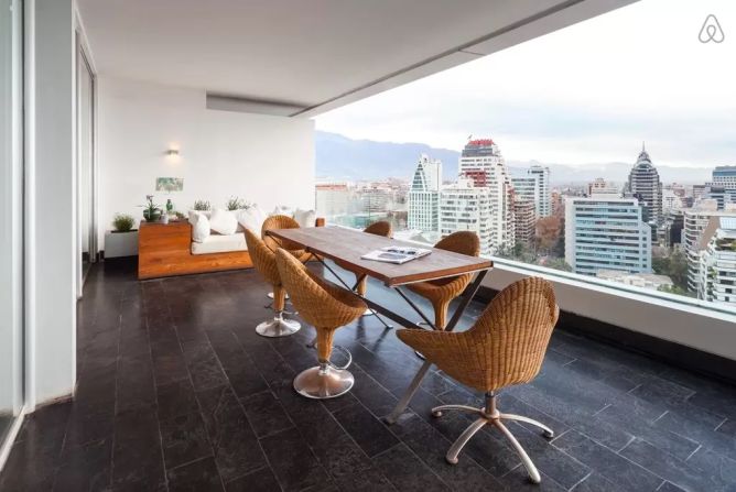 Santiago is one of Latin America's fastest-growing business hubs. This luxury apartment offers spectacular views of the city and lots of space in which to work.