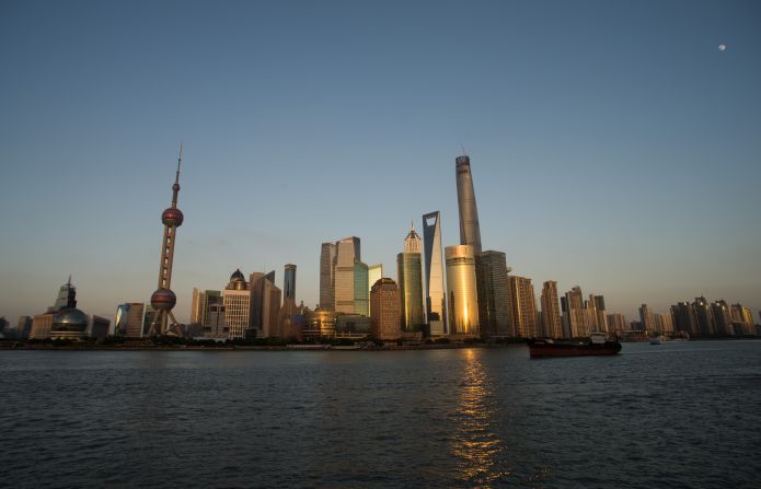 Shanghai Tower, right, is the world's second-tallest building at 2,073 feet (632 meters). The city's Oriental Pearl radio and TV tower, left, is a recognizable landmark in the Pudong district.