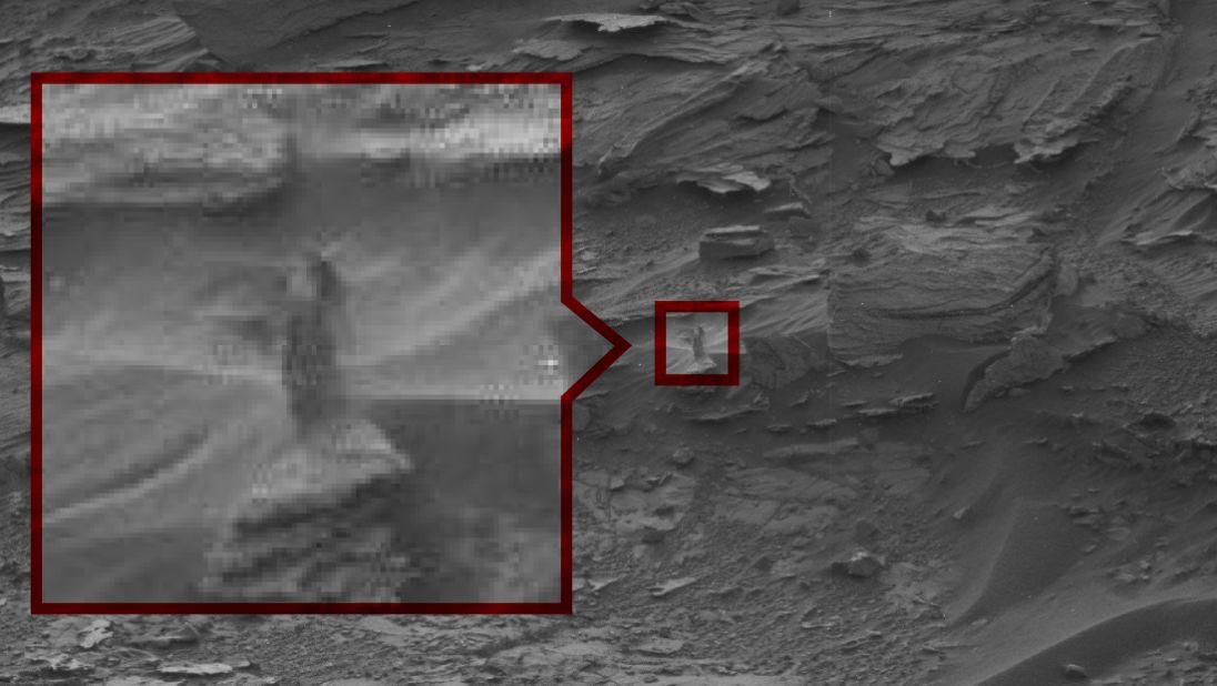 The Strange Lady: This ghost-like "woman" seems to peering down at Curiosity from a cliff. NASA says it's probably just an oddly shaped drift of sand.