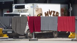 A refrigerated truck, in which bodies of 71 migrants have been found on the A 4 Austrian highway, is parked in a facility which used to be a veterinary station at the border in Nickelsdorf, Austria on August 28, 2015. Austrian police said Friday that three people were in custody in Hungary over the discovery of 71 dead migrants in an abandoned truck with Hungarian number plates.  AFP PHOTO / VLADIMIR SIMICEK        (Photo credit should read Vladimir Simicek/AFP/Getty Images)