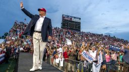 U.S. Republican presidential candidate Donald Trump takes the stage at Ladd-Peebles Stadium on August 21, 2015 in Mobile, Alabama.