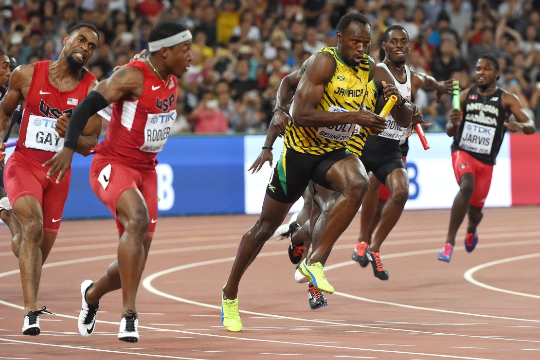 Tyson Gay and Mike Rodgers (nearest) of the USA attempt to pass the baton in the 4x100m relay final at the 2015 World Athletic Championships. 