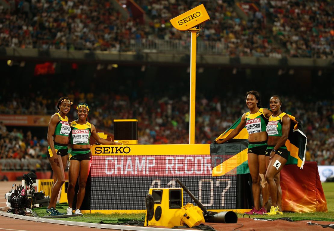 Veronica Campbell-Brown, Natasha Morrison, Elaine Thompson and Shelly-Ann Fraser-Pryce of Jamaica celebrate after winning gold in the Women's 4x100m final at the World Athletics Championships in Beijing.