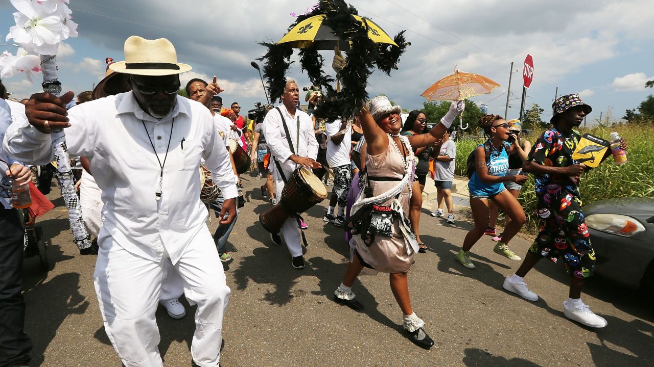 After a solemn morning, New Orleans residents celebrated the city's comeback. 