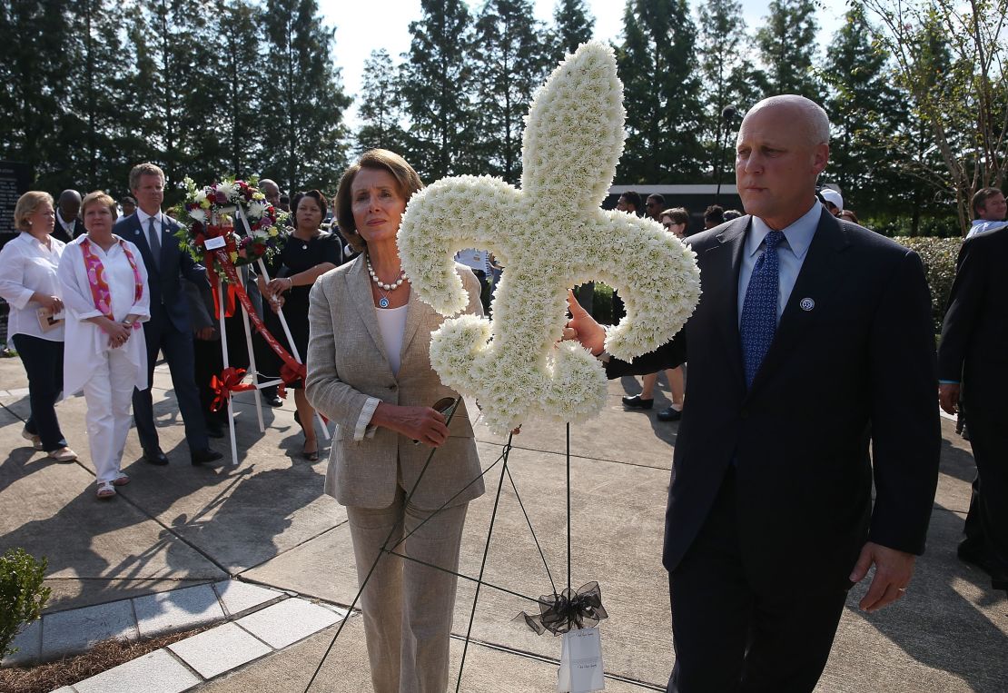 U.S. Rep. Nancy Pelosi and New Orleans Mayor Mitch Landrieu  lay a wreath at a memorial on Saturday.
