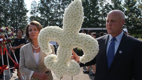 U.S. Rep. Nancy Pelosi and New Orleans Mayor Mitch Landrieu lay a wreath at a memorial on Saturday.