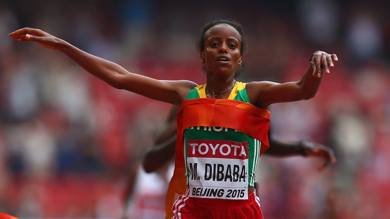 Mare Dibaba of Ethiopia takes gold in the women's marathon after a sprint finish in the Bird's Nest Stadium.
