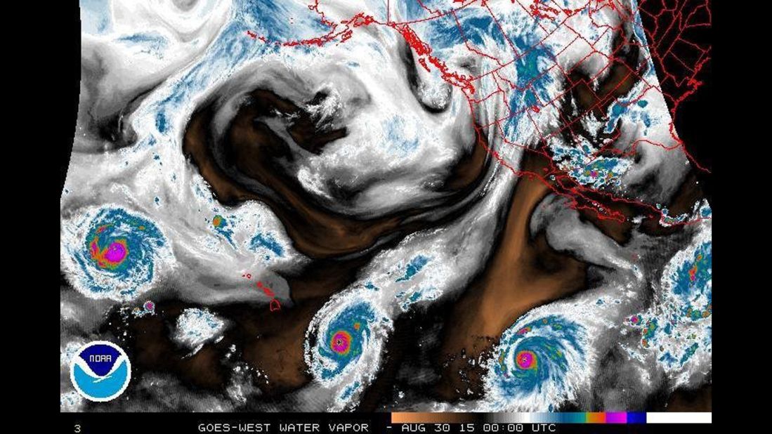 Three hurricanes are spinning in the eastern and central Pacific Ocean. This image shows the water vapor. This is the first time there have been three active hurricanes in the eastern or central Pacific this season, according to NASA. From left the storms are: Hurricane Kilo, Hurricane Ignacio and Hurricane Jimena. Ignacio prompted a tropical storm watch for portions of Hawaii on August 30.