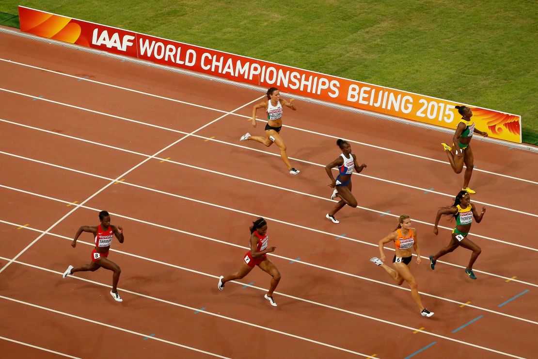 Dafne Schippers of the Netherlands (3rd R) crosses the finish line to win gold.