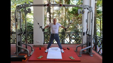Putin exercises during his meeting with Medvedev on  August 30.
