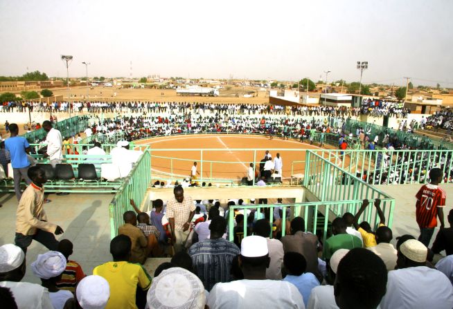 Arenas such as this one in Hajj Yousif, Khartoum, host the events. The ring is far larger than that used in Olympic wrestling and is covered with sand rather than softer, vinyl-covered mats.