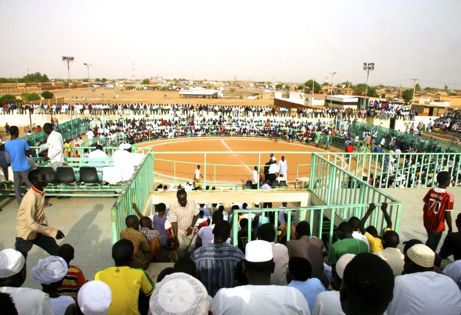 Arenas such as this one in Hajj Yousif, Khartoum, host the events. The ring is far larger than that used in Olympic wrestling and is covered with sand rather than softer, vinyl-covered mats.