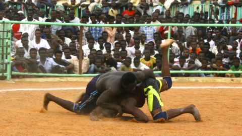 The wrestling tournaments attract hundreds of spectators in Khartoum. 