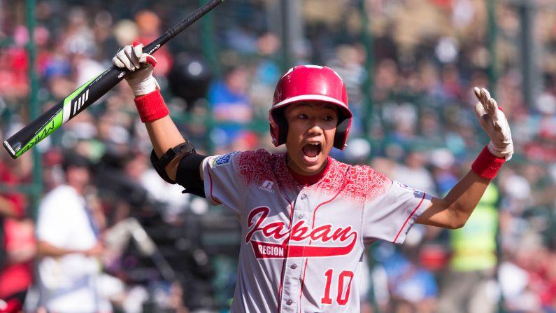 Shingo Tomita of Team Japan reacts to a home run hit by his twin brother, Kengo, during the championship game of the Little League World Series on Sunday, August 30. The team from Tokyo trailed the team from Lewisberry, Pennsylvania, 10-2 after the first inning. But it rallied for an 18-11 victory to claim the world title. 