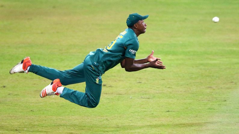 South African cricketer Kagiso Rabada goes in for a catch against New Zealand during a one-day international match played Wednesday, August 26, in Durban, South Africa. South Africa won the match by 62 runs.
