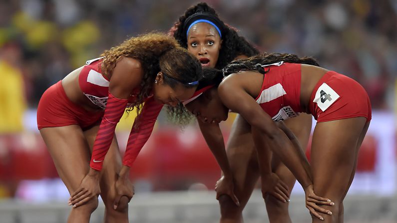 American athletes Sanya Richards-Ross, Natasha Hastings and Allyson Felix huddle at the World Championships after finishing second in the 4x400-meter relay on Sunday, August 30. A team from Jamaica won the race.