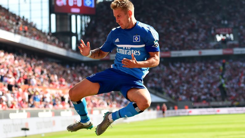 Hamburg's Lewis Holtby celebrates after he scored the opening goal of a Bundesliga match in Cologne, Germany, on Saturday, August 29. Cologne came back, however, to win 2-1.