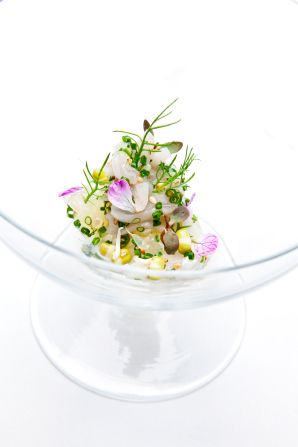 Providence's Engawa (fluke fin) offering includes sprouted mung bean, radish blossom and oro blanco.