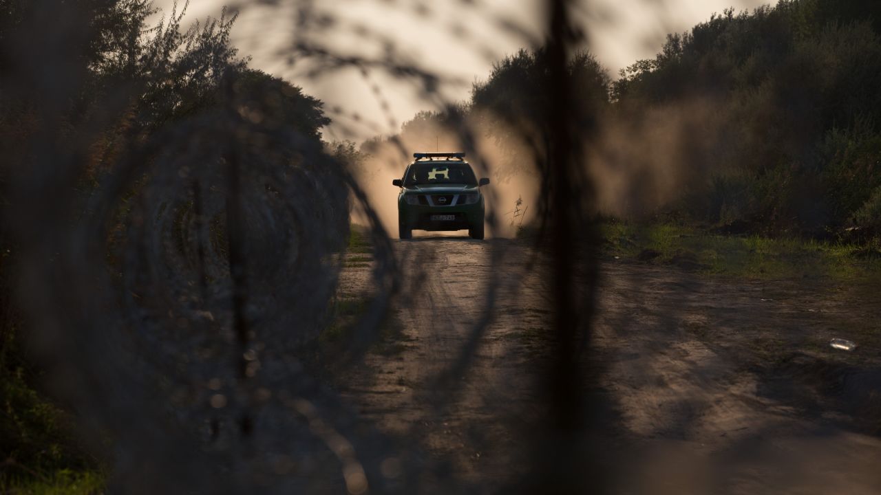 SZEGED, HUNGARY - AUGUST 31: Hungarian police patrol the border from Serbia into Hungary close to the village of Roszke on August 31, 2015 near Szeged, Hungary. According to the Hungarian authorities a record number of migrants from many parts of the Middle East, Africa and Asia crossed the border from Serbia earlier this week, said to be due in part to the erection of a new fence that is due to be completed at the end of this month. Since the beginning of 2015 the number of migrants using the so-called Balkans route has exploded with migrants arriving in Greece from Turkey and then travelling on through Macedonia and Serbia before entering the EU via Hungary. The massive increase, said to be the largest migration of people since World War II, led Hungarian Prime Minister Victor Orban to order Hungary's army to build a steel and barbed wire security barrier along its entire border with Serbia, after more than 100,000 asylum seekers from a variety of countries and war zones entered the country so far this year. (Photo by Matt Cardy/Getty Images)