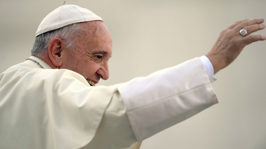 Pope Francis waves to the crowd aboard his Popemobile as he arrives for an audience with participants of an international pilgrimage of altar servers on August 4, 2015 in Saint Peter's Square at the Vatican. AFP PHOTO / FILIPPO MONTEFORTE        (Photo credit should read FILIPPO MONTEFORTE/AFP/Getty Images)