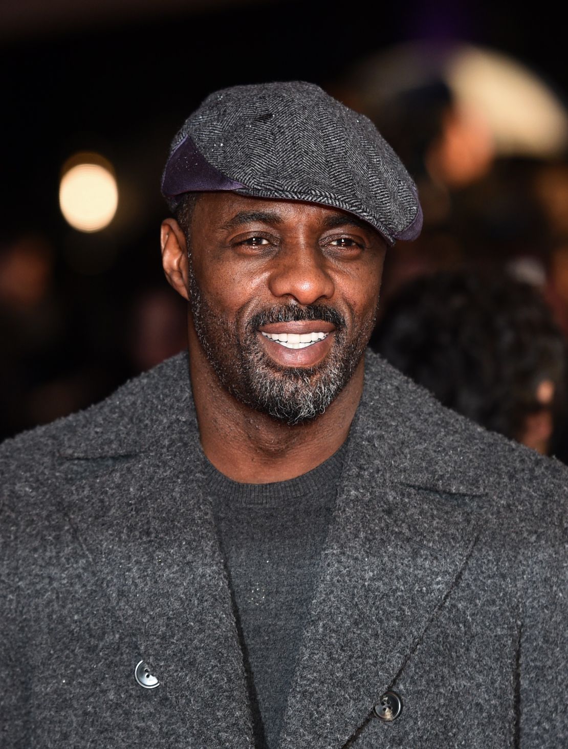 British actor Idris Elba poses for photographers ahead of the World Premiere of 'The Gunman' in central London on February 16, 2015.