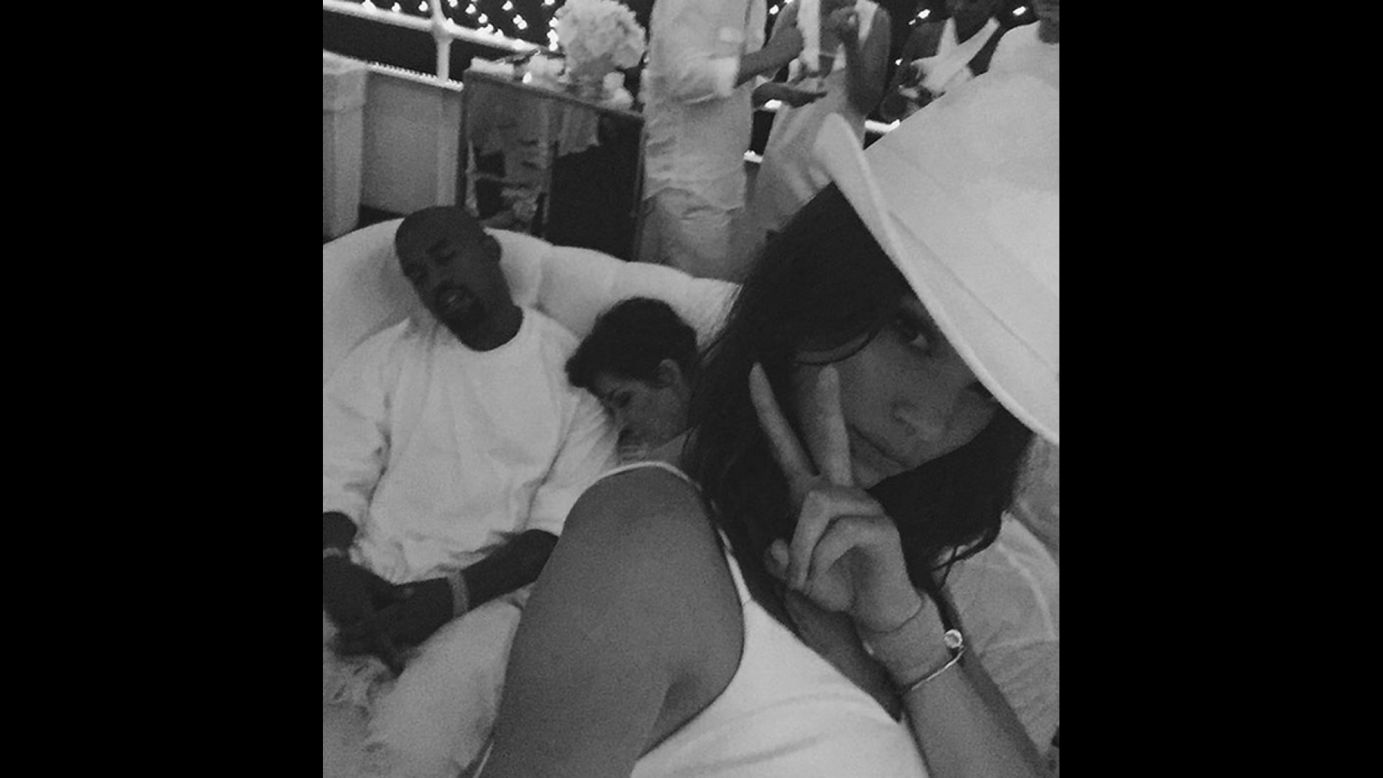 Television personality Kendall Jenner <a href="https://instagram.com/p/678W6ojo88/" target="_blank" target="_blank">takes a selfie</a> of her brother-in-law, rapper Kanye West, snoozing next to her mother, Kris, on Friday, August 28.