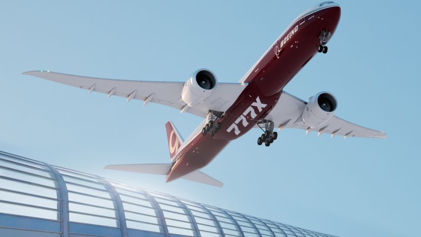 777X artist rendering of take off; landing with fence; wheels down; underneath from right side